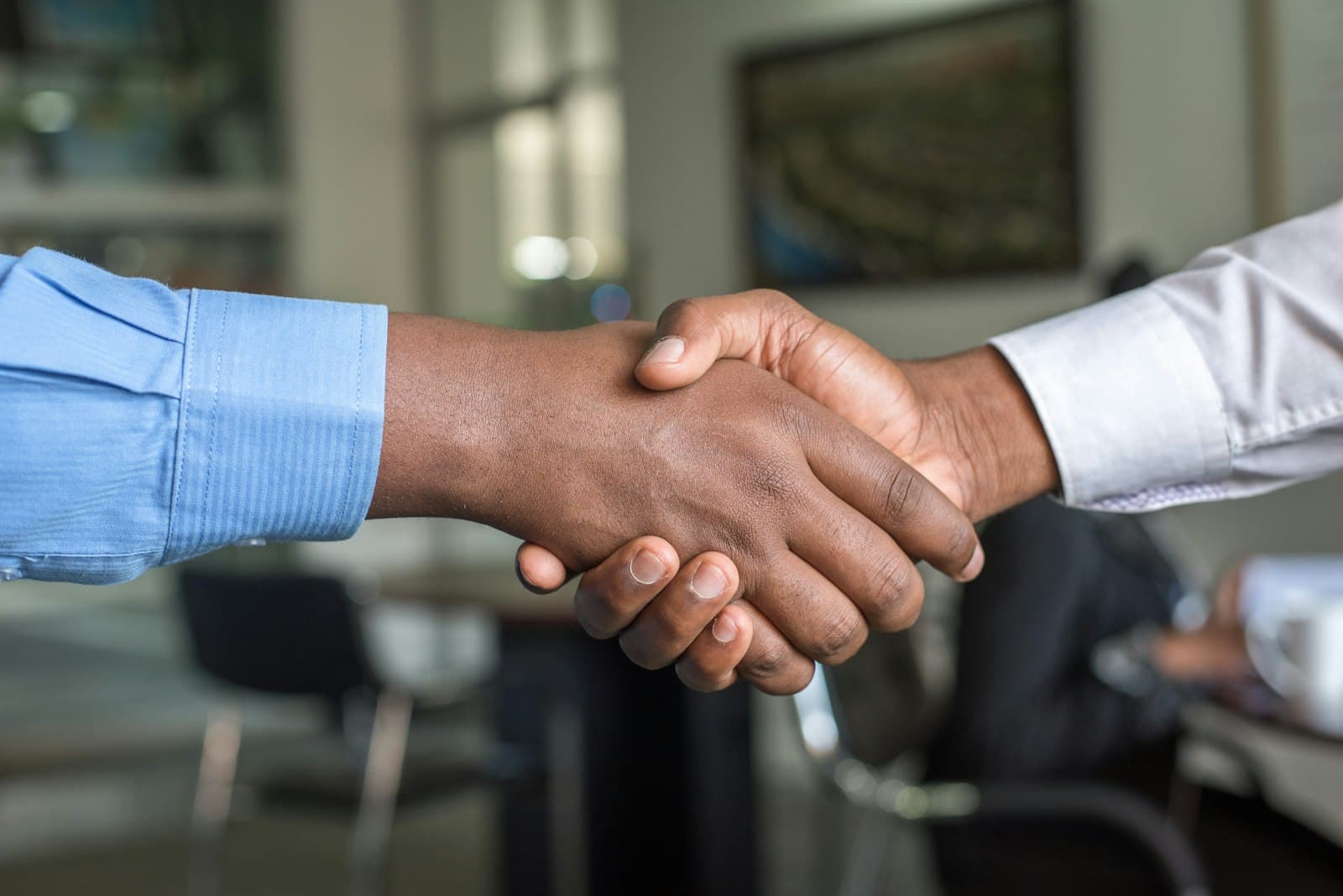Recruiter interviewing a candidate in a modern office
